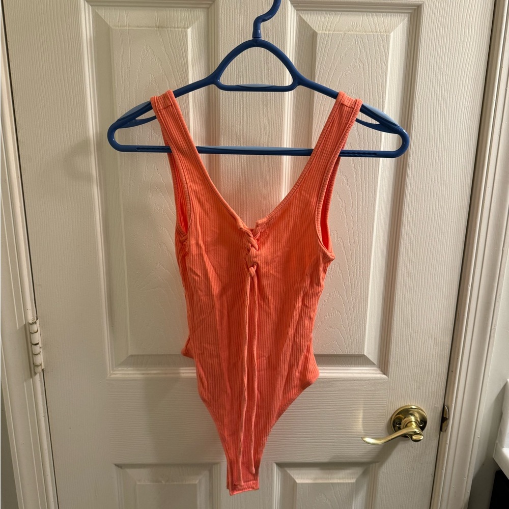 Lash Next Door Brooklyn and Bailey Tie Bodysuit